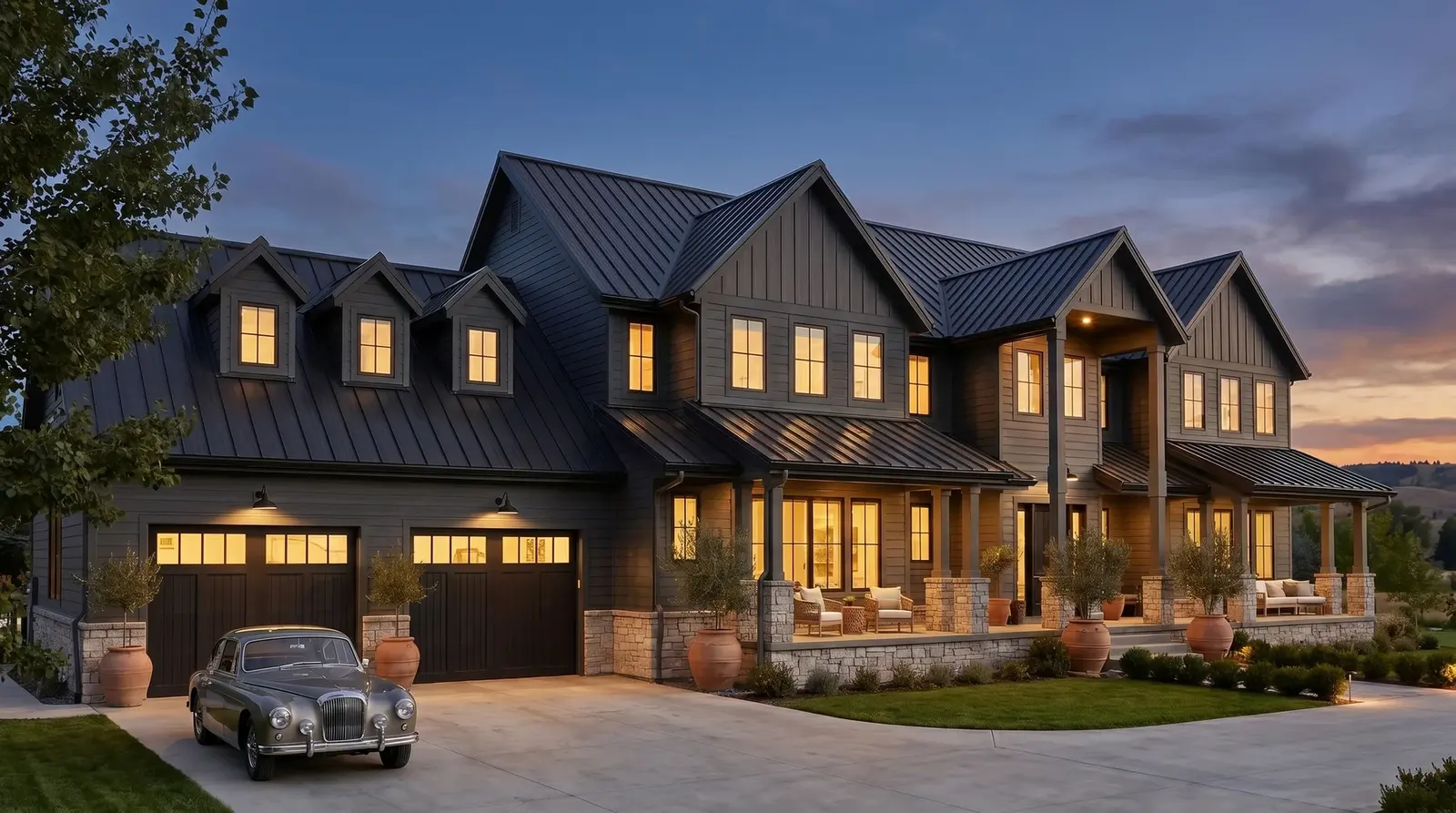 A two-storey home at dusk with its windows lit